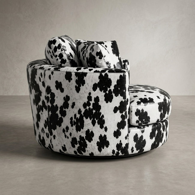 Cuddle Swivel Chair - Black Patch Cowhide Leather Main Image