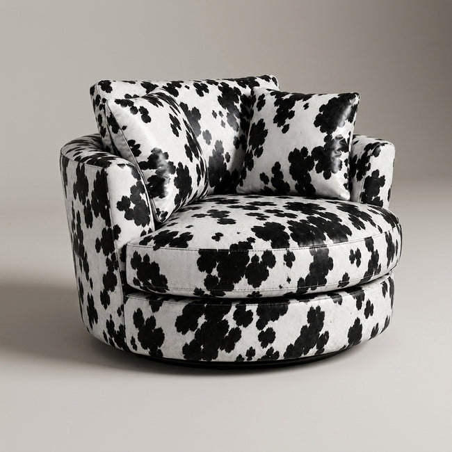 Cuddle Swivel Chair - Black Patch Cowhide Leather Hover Image